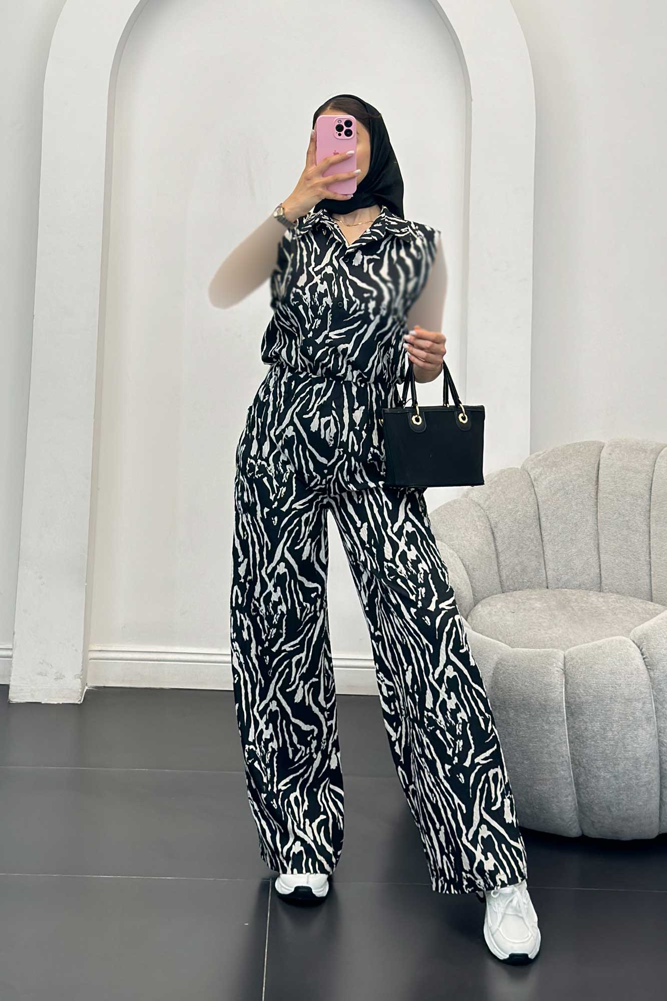 اورال کاملس کمرکش دکمه ای