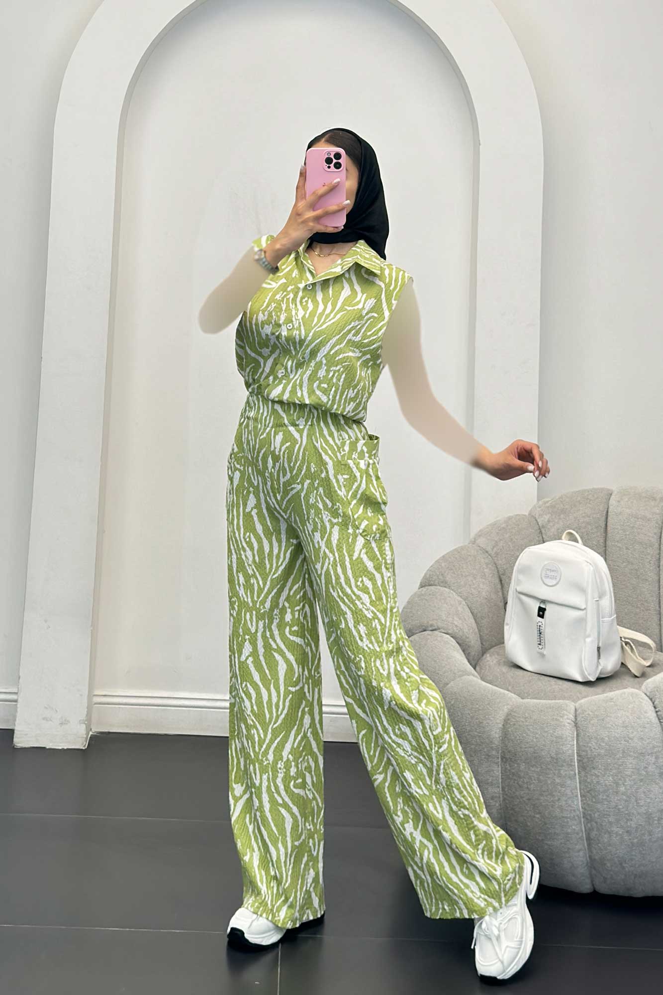 اورال کاملس کمرکش دکمه ای