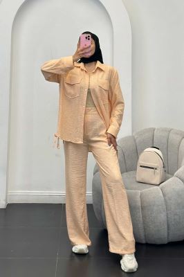 ست مانتو و شلوار شانتون برفکی بغل بنددار