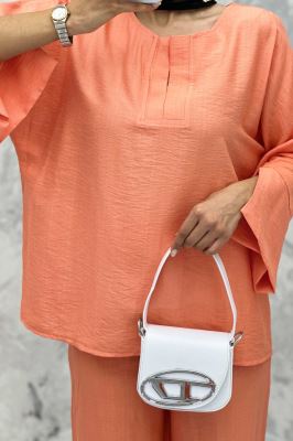 ست مانتو و شلوار یقه چاکدار بابوس