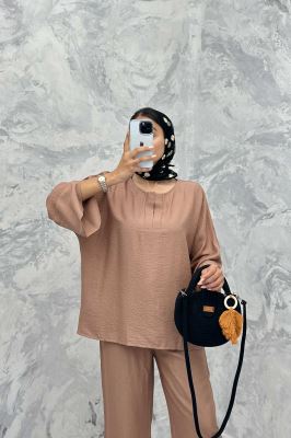 ست مانتو و شلوار یقه چاکدار بابوس