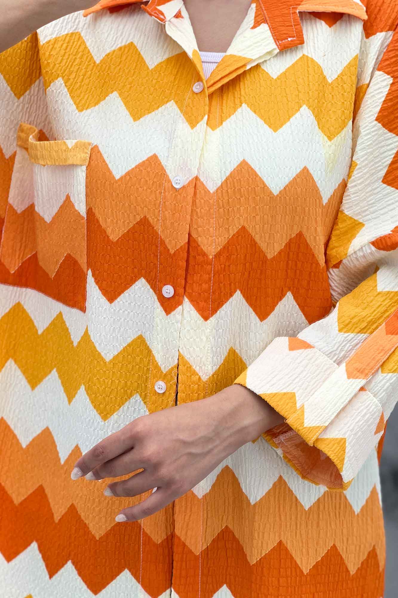 مانتو کراش جناقی پشت دکمه تک جیب