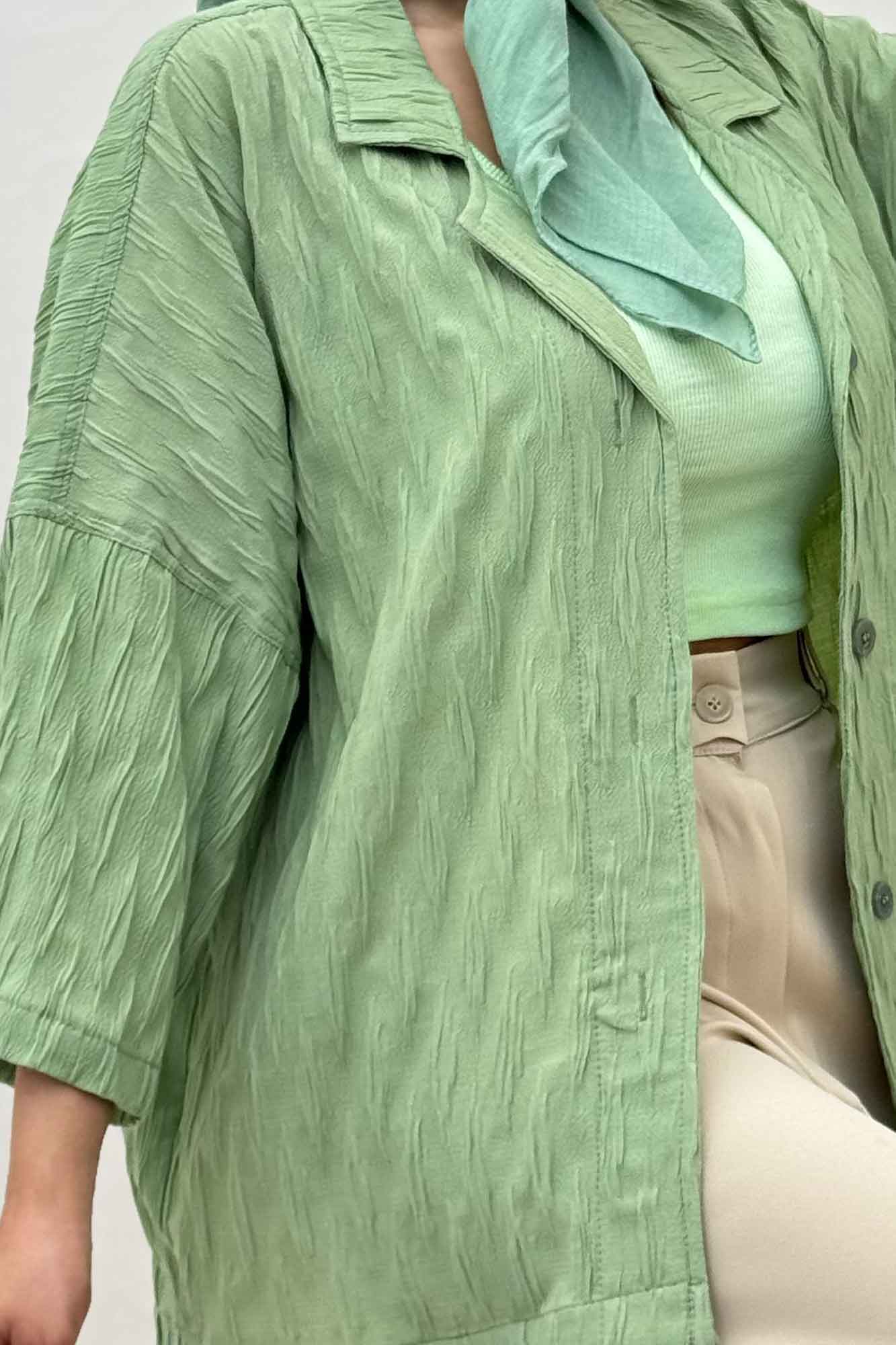 مانتو حلزونی یقه شکاری آستین سه رب