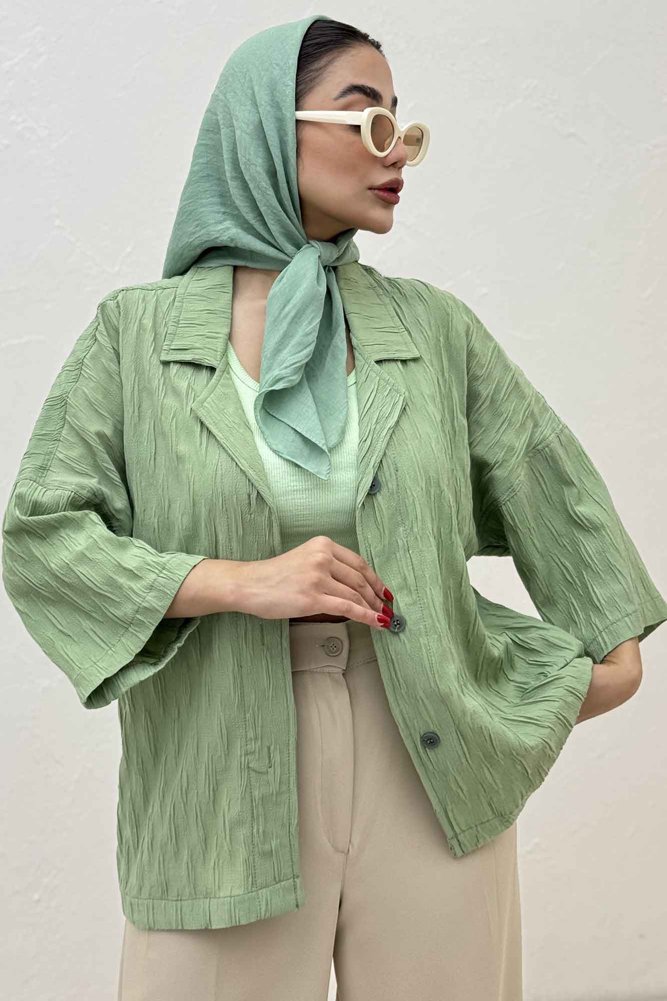 مانتو حلزونی یقه شکاری آستین سه رب