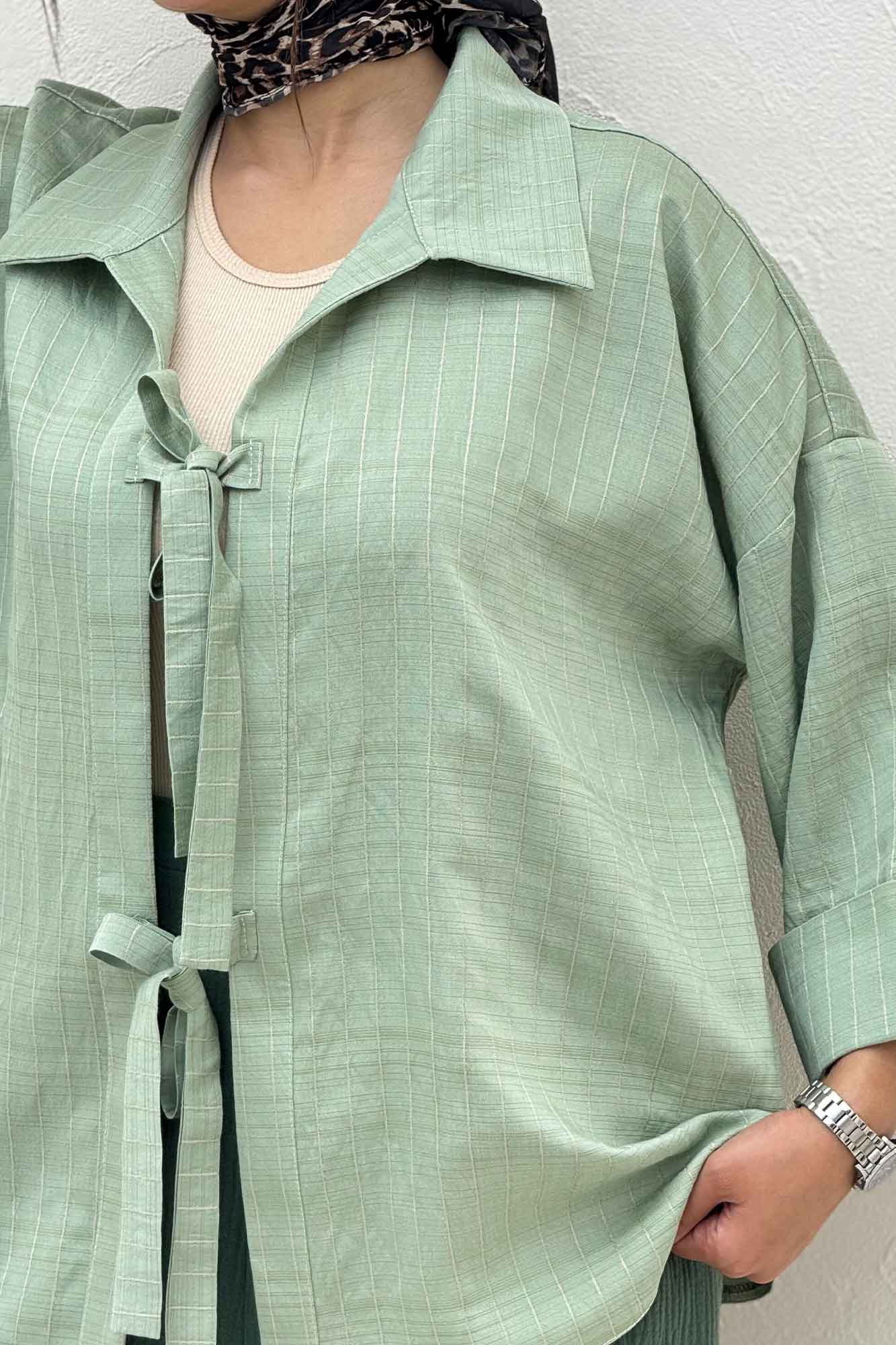 مانتو پشت ریلی دو بند پری راه راه