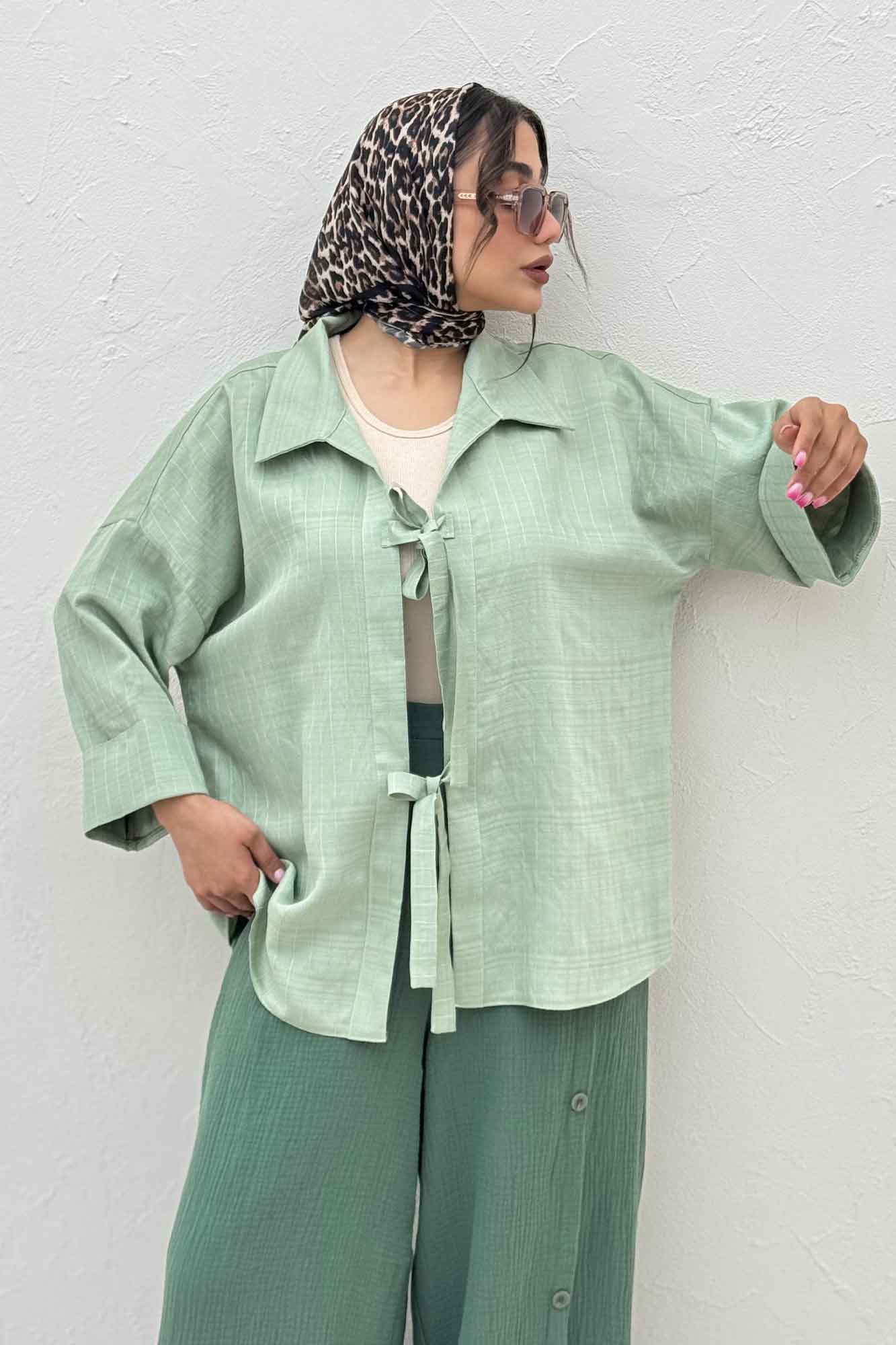 مانتو پشت ریلی دو بند پری راه راه