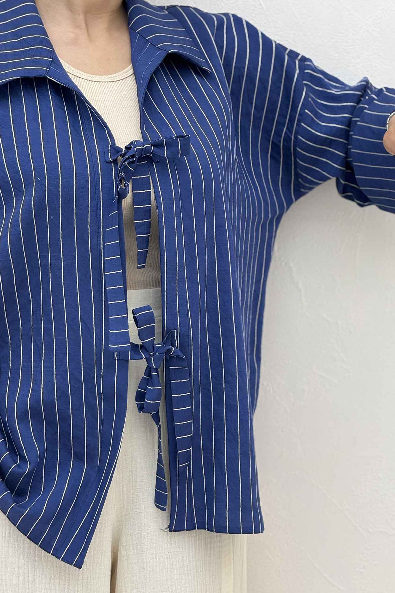 مانتو پشت ریلی دو بند پری راه راه