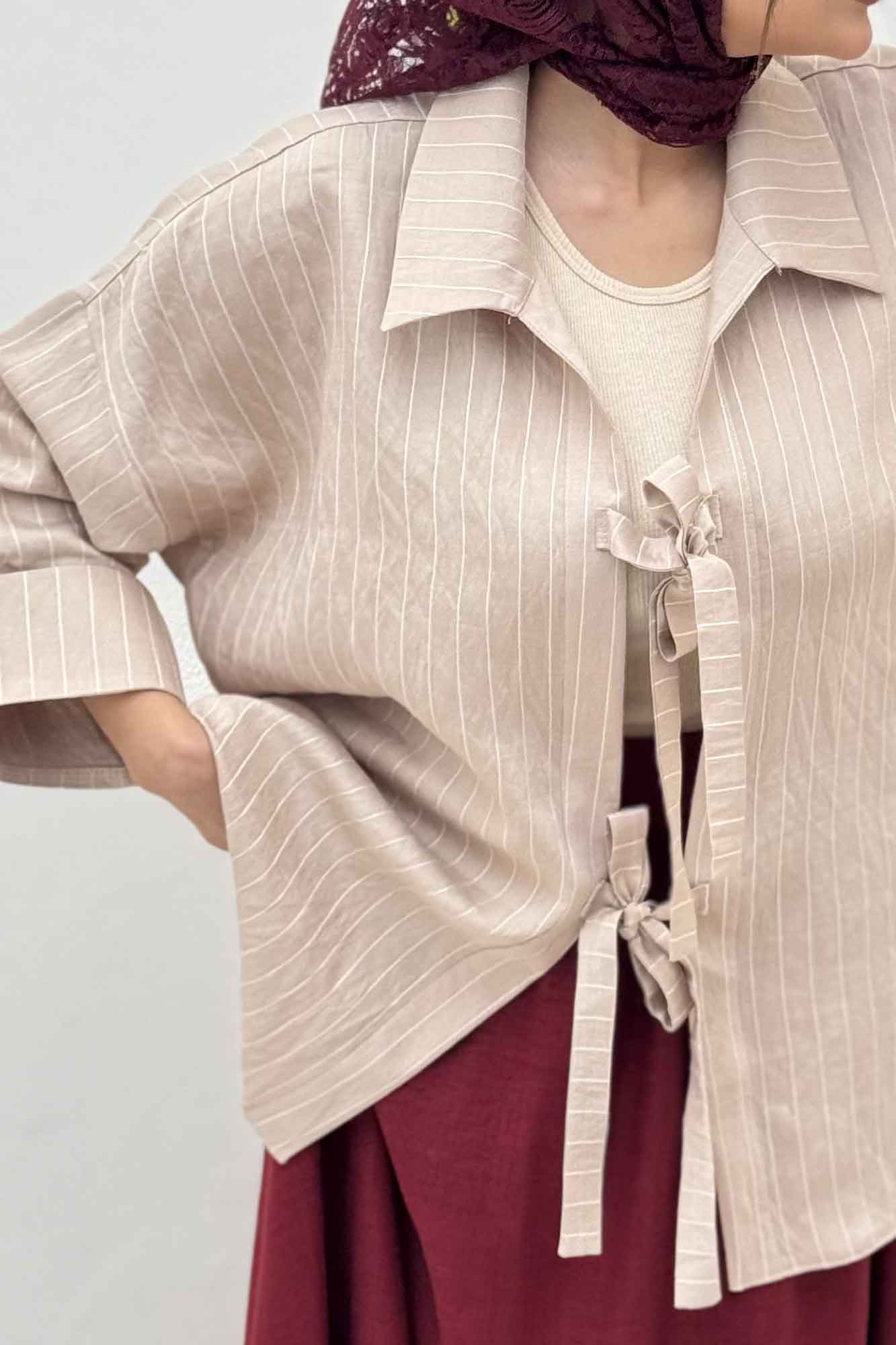 مانتو پشت ریلی دو بند پری راه راه