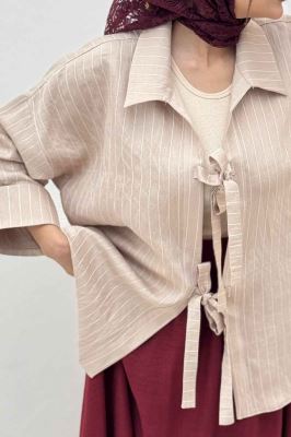 مانتو پشت ریلی دو بند پری راه راه