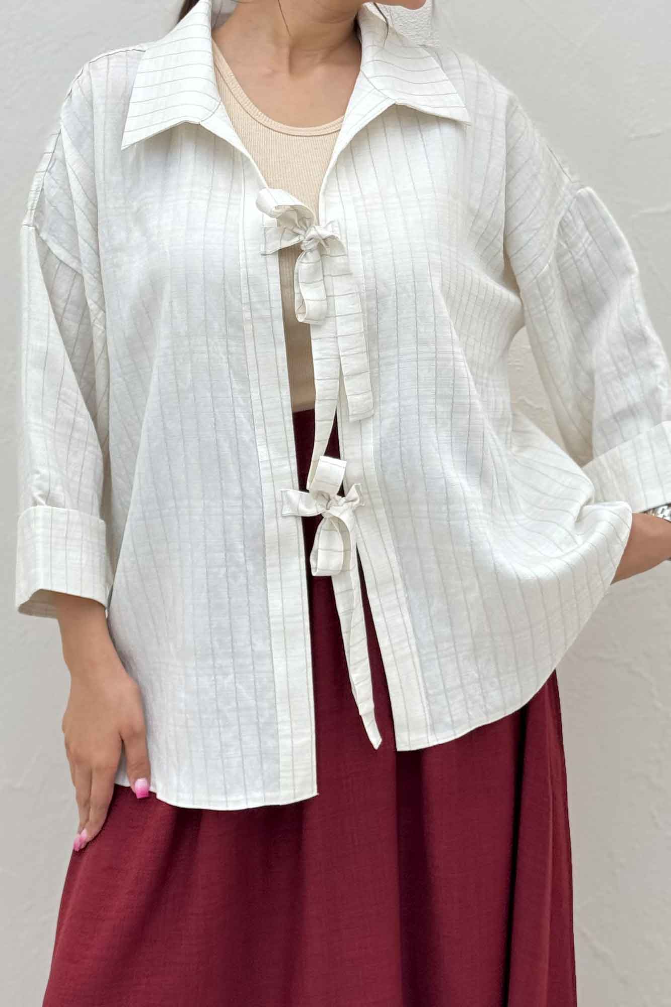 مانتو پشت ریلی دو بند پری راه راه