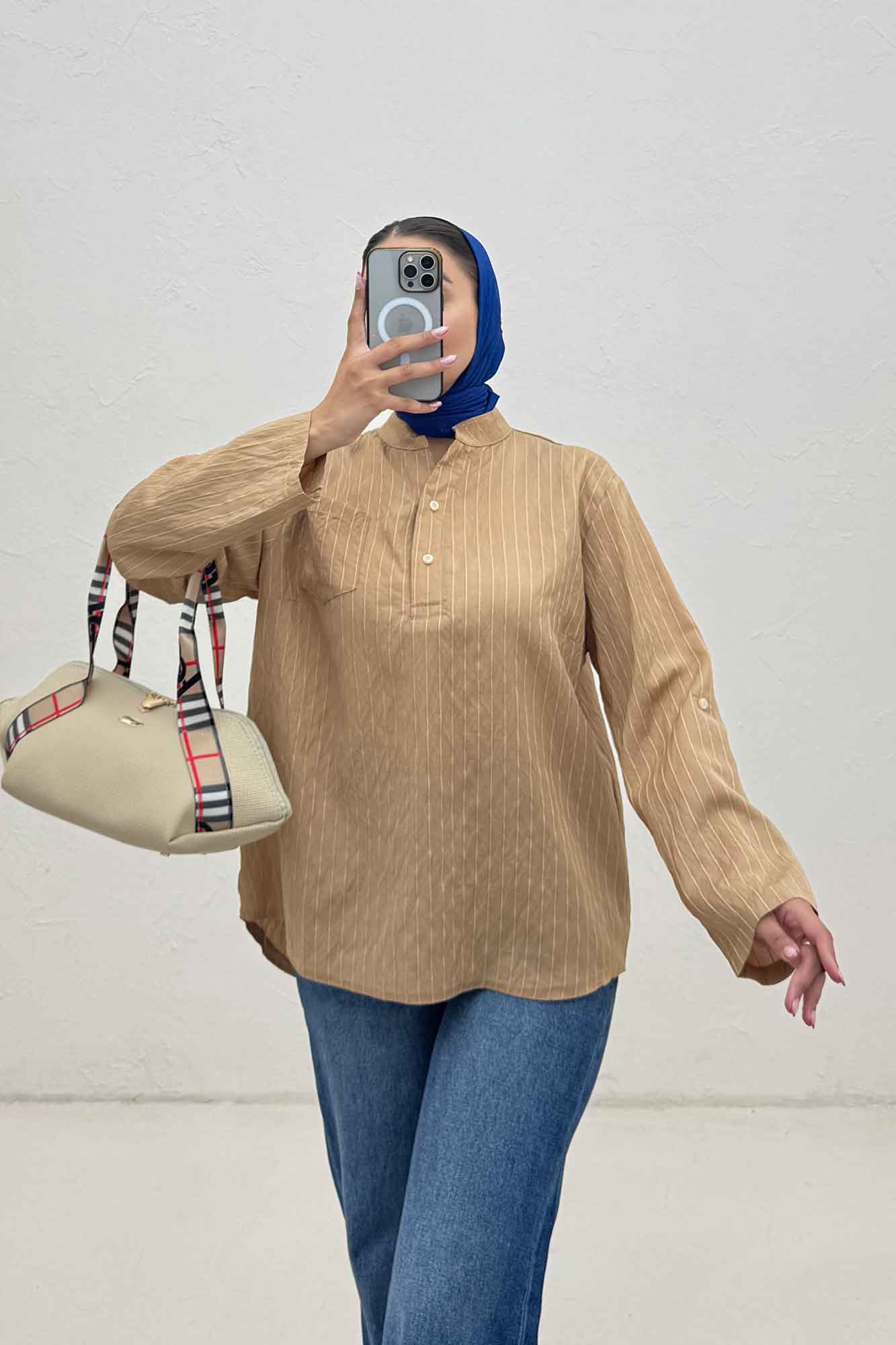 بلوز یقه بلیطی پلوتی تک جیب