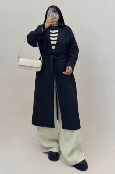 بارانی بلند یقه پاگن دار پشت بلدینگ 